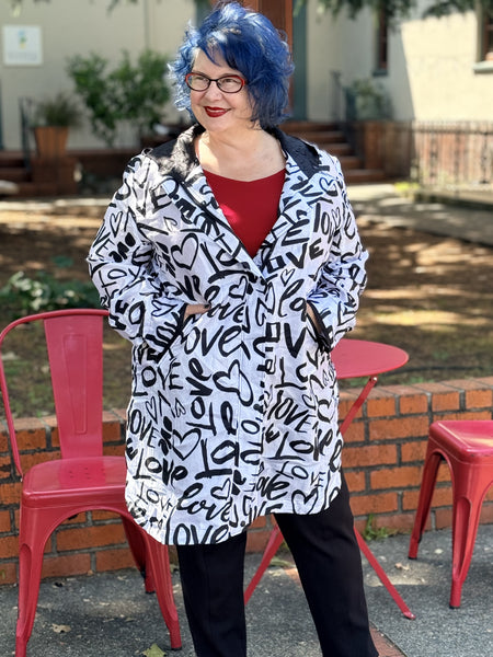 Lindi Travel Love Raincoat- Black and White