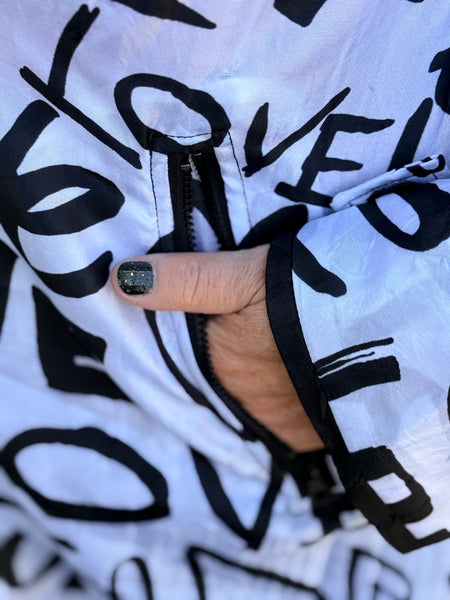 Lindi Travel Love Raincoat- Black and White