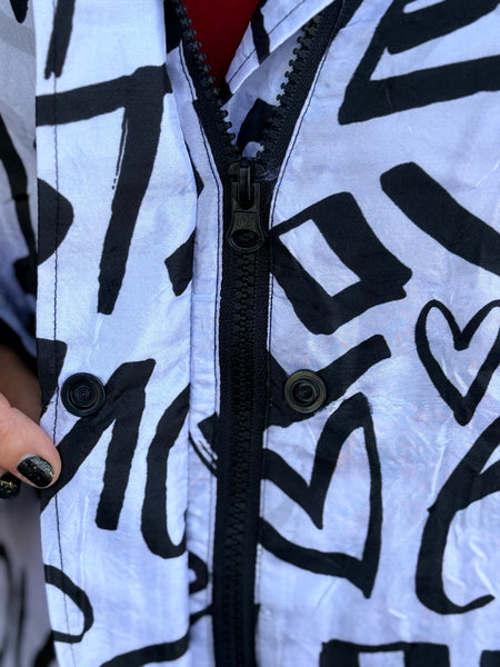 Lindi Travel Love Raincoat- Black and White