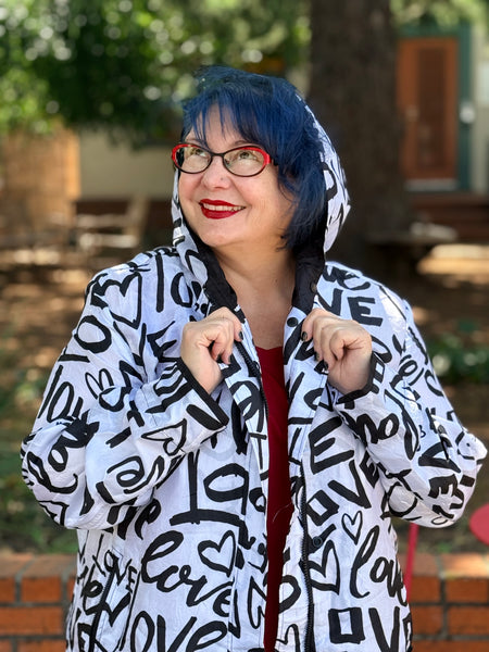 Lindi Travel Love Raincoat- Black and White